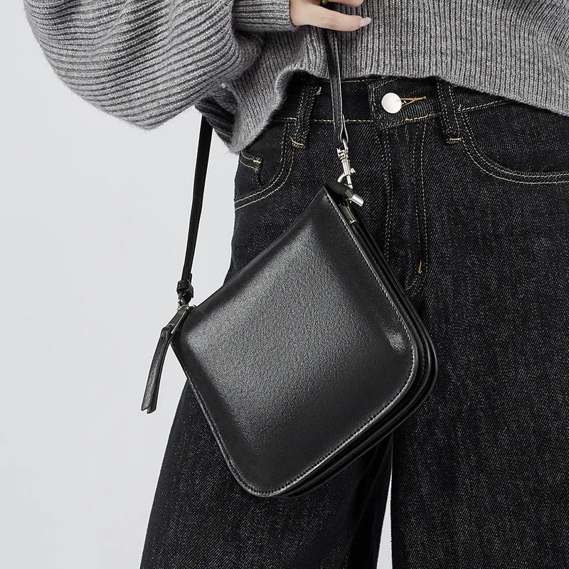Autumn and winter new leather women's bags, shoulder messenger bags, mobile phone bags, women's bucket bags, shoulder small bags, armpit bags.