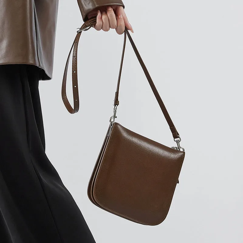 Autumn and winter new leather women's bags, shoulder messenger bags, mobile phone bags, women's bucket bags, shoulder small bags, armpit bags.